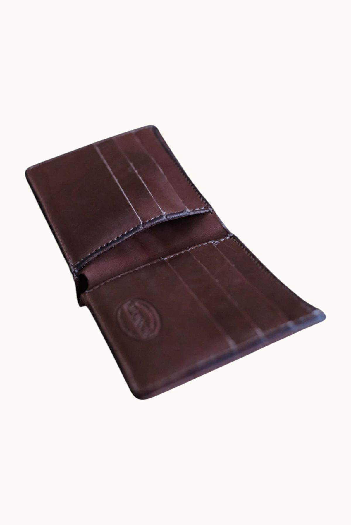 Classic Billfold interior with hidden pocket flap lifted, angled view