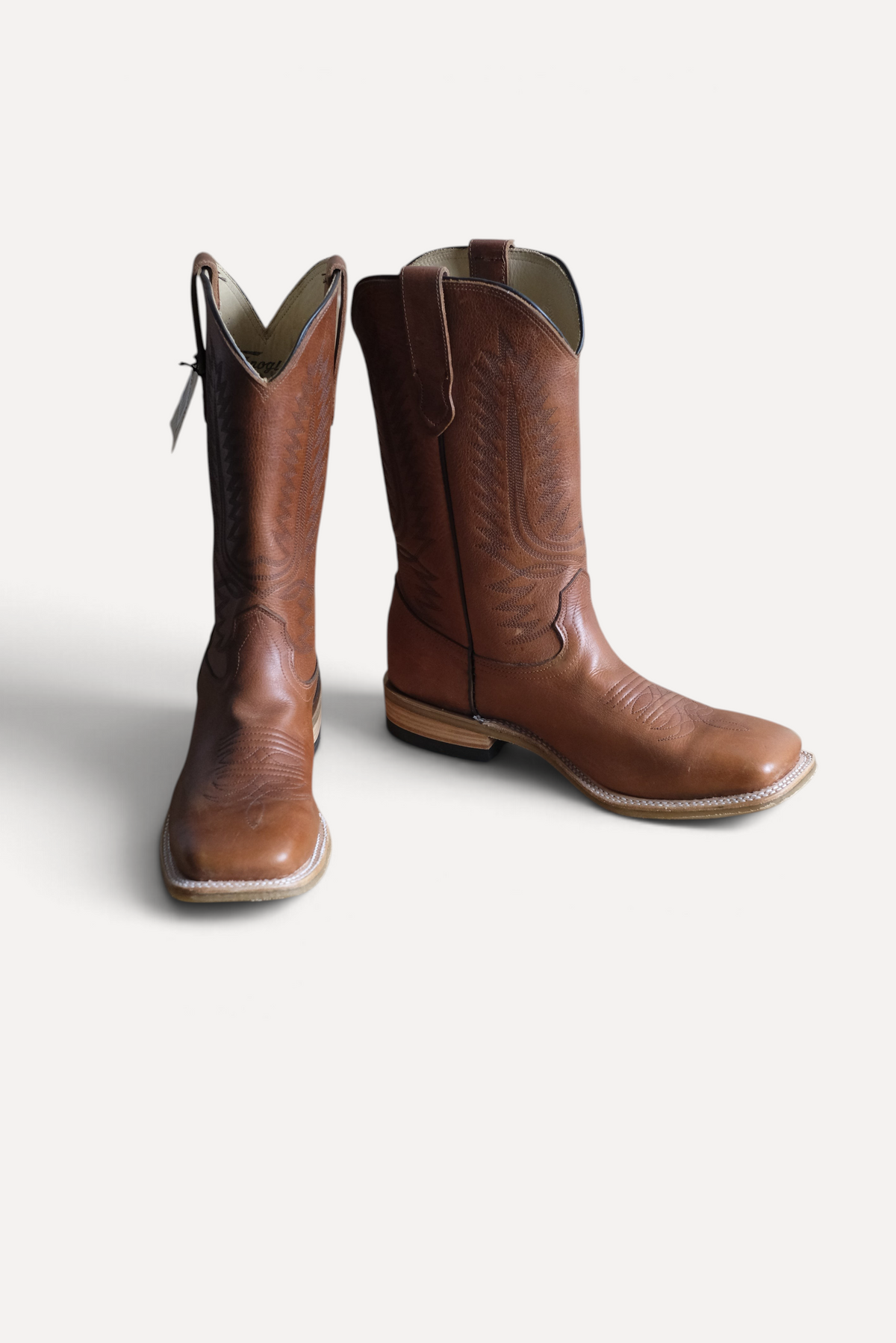 Pair of cognac OPU square toe cowboy boots, front view