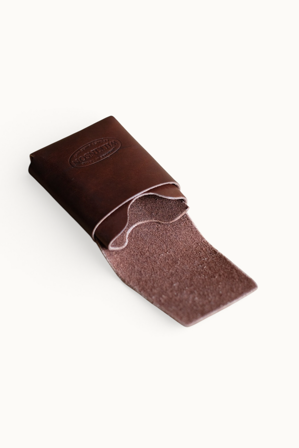 Wilkinson's Fine Goods Fry card wallet made from a single piece of brown full-grain leather with no stitching.