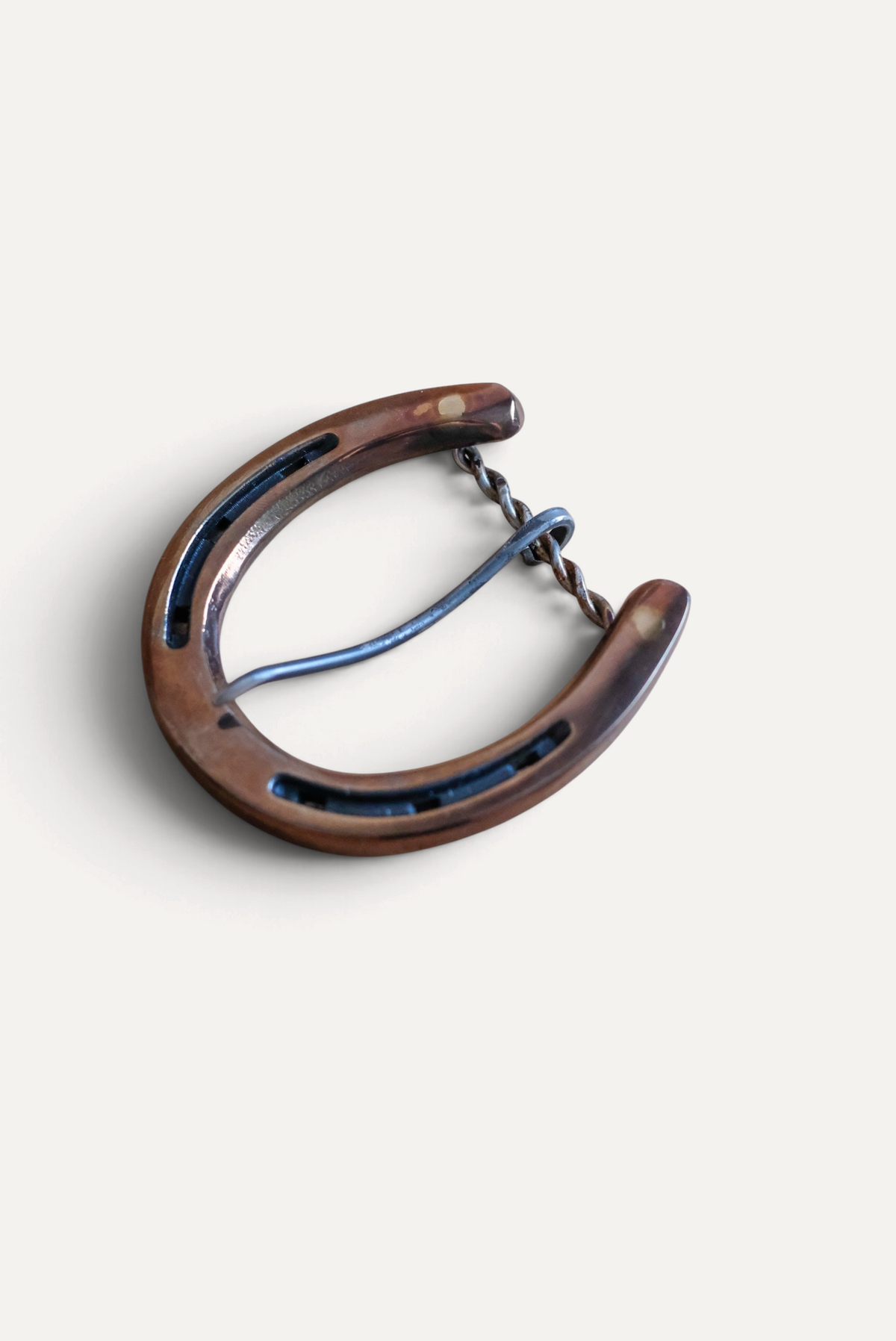 Wilkinson's Fine Goods hand-forged steel pony horseshoe buckle with an antique heat-treated finish.