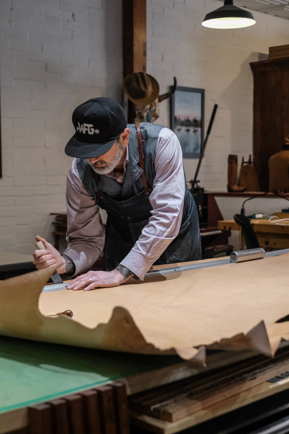 The panel is cut to size from the hide.