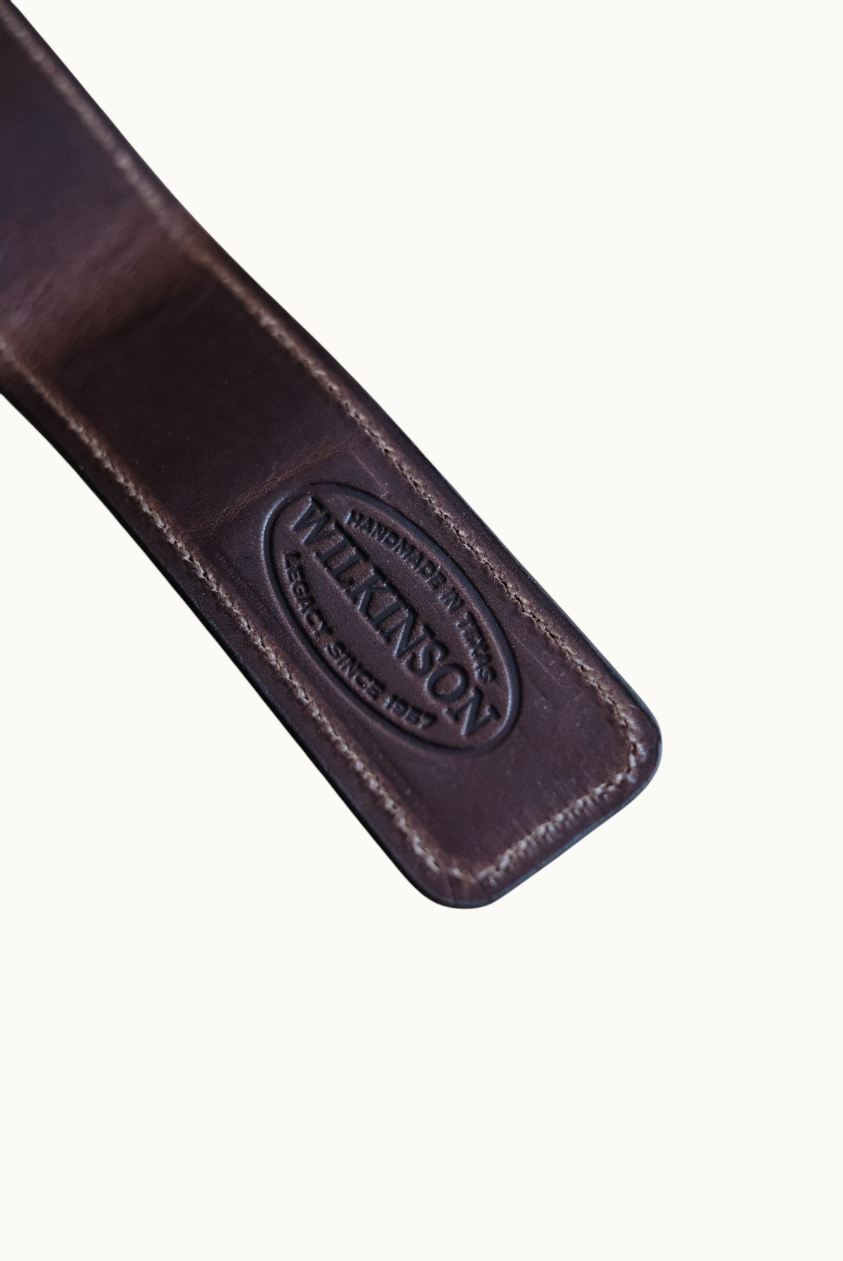 Wilkinson's Fine Goods Alligator Bandera money clip in dark brown leather with embossed brand logo detail