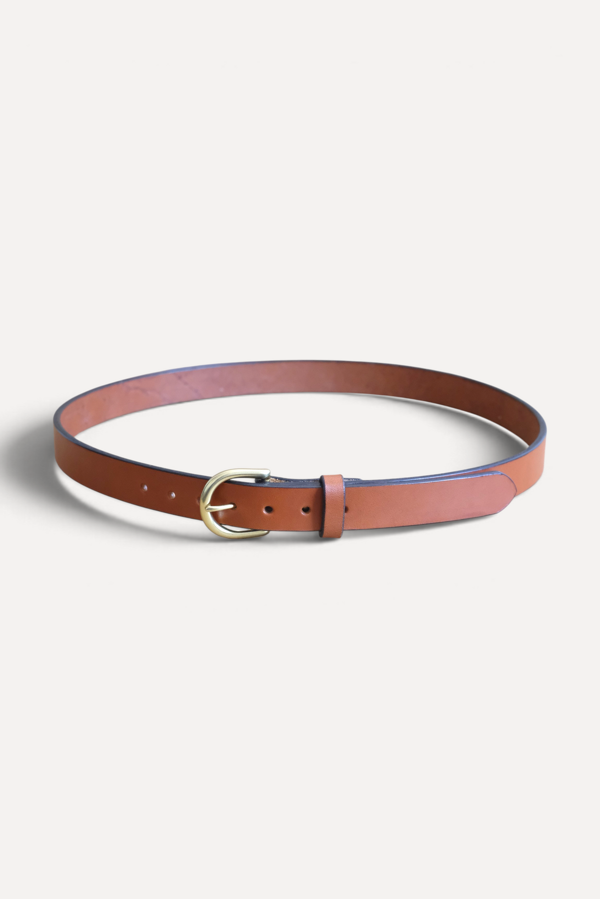 Wilkinson's Fine Goods 1-inch brown English bridle leather belt with a natural brass heel bar buckle.
