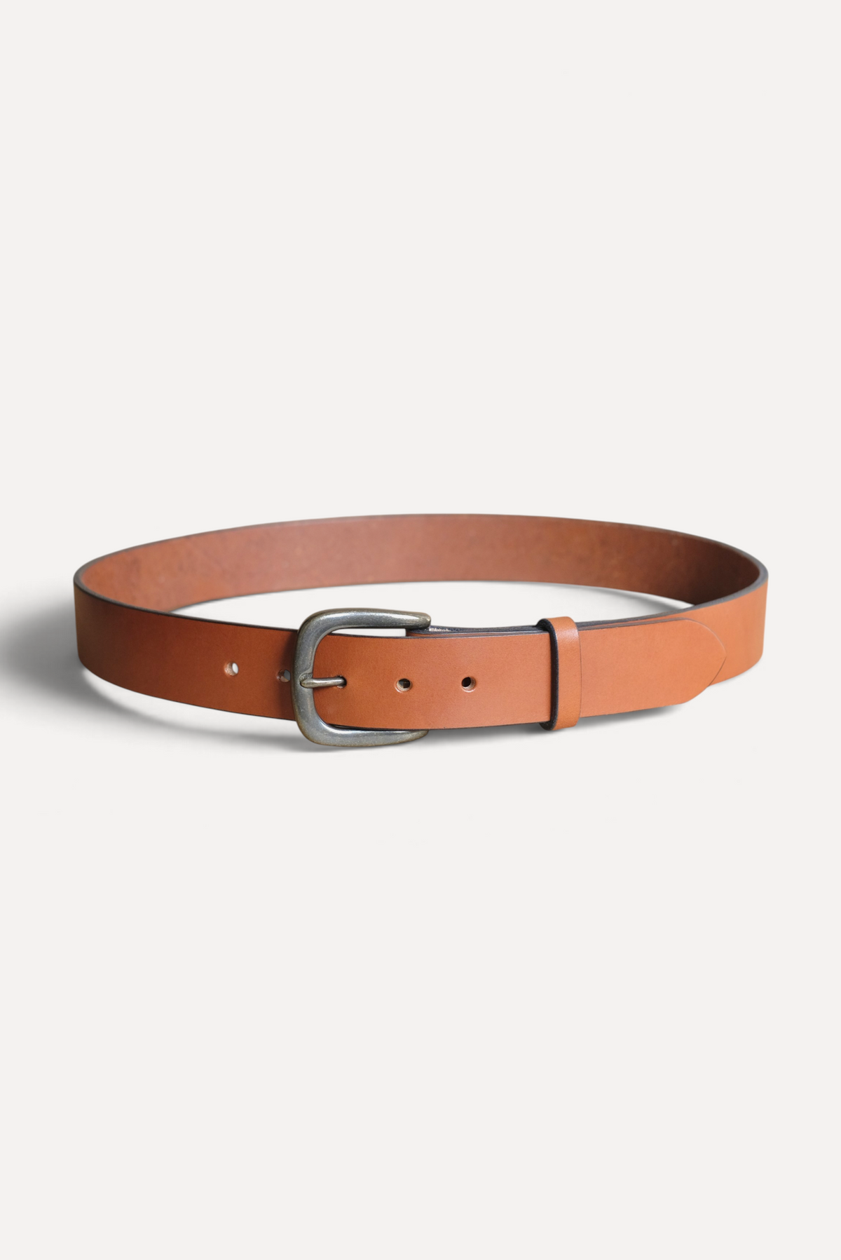Wilkinson's Fine Goods 1.5 inch standard belt in tan full-grain vegetable-tanned leather with a metal buckle.