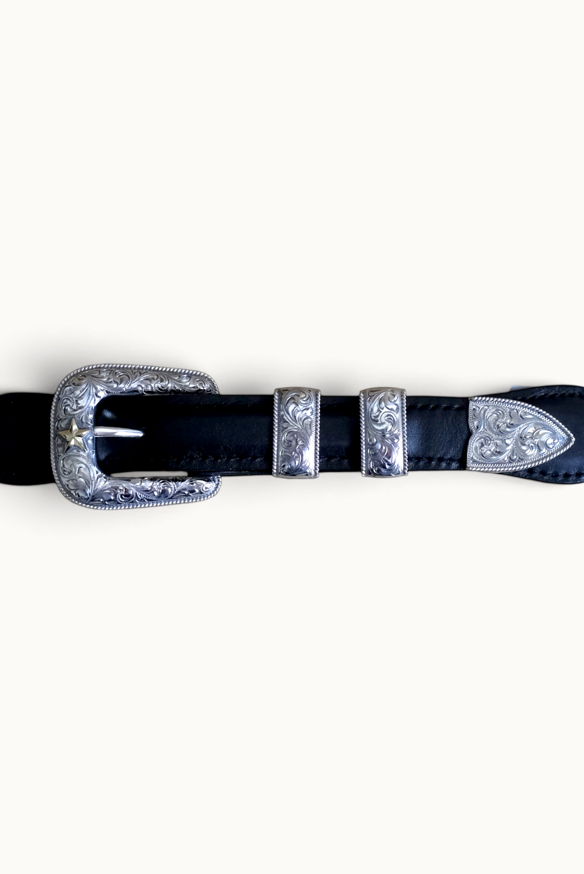 Wilkinson's Fine Goods The Senator 1-inch sterling silver buckle set with hand engraving and a 14k gold star detail.
